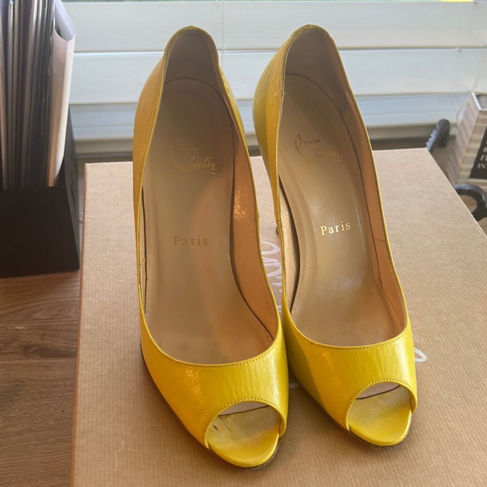 Christian Louboutin pumps.